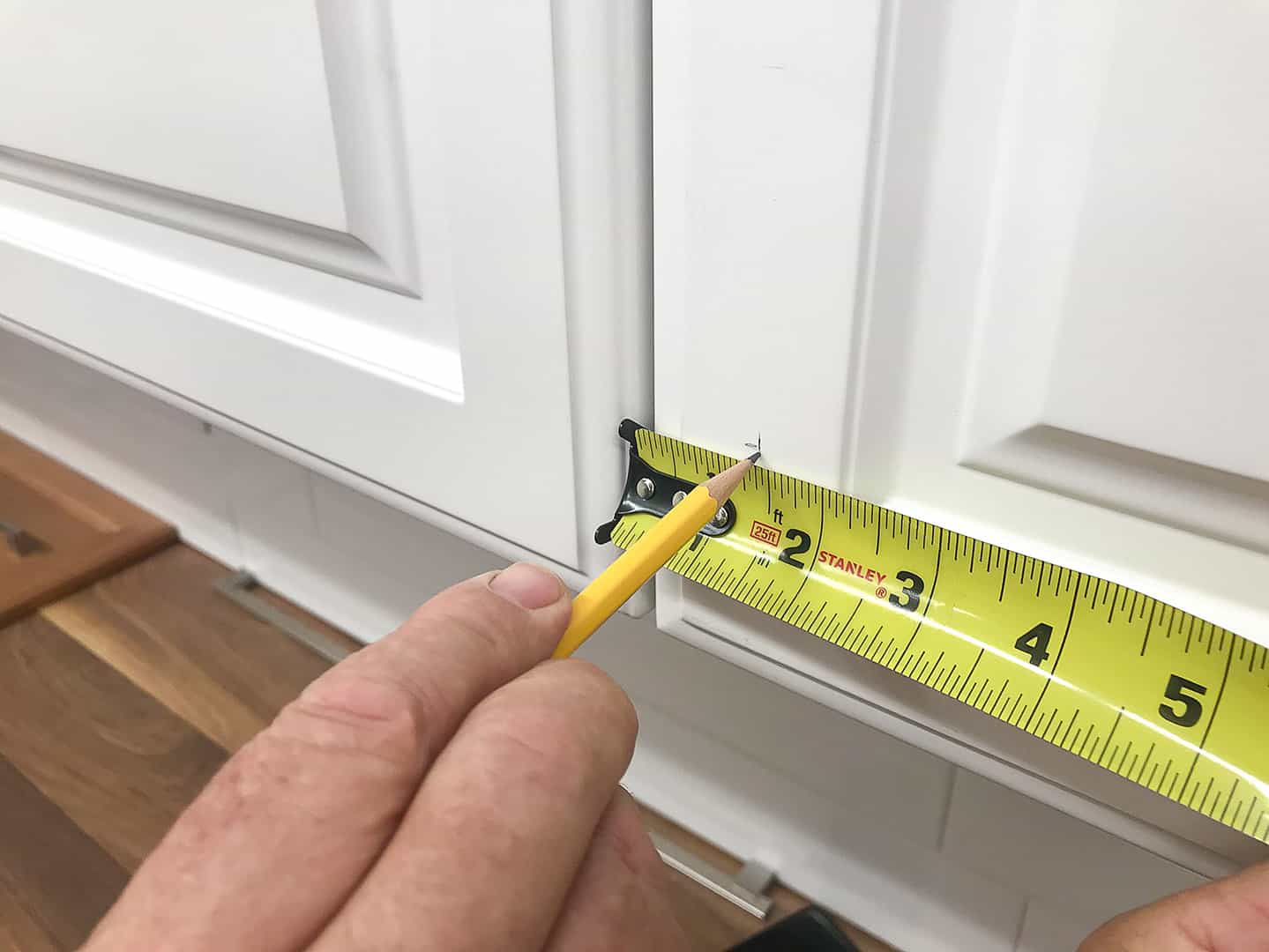 knob installation on cabinet door with TP-1934 Cabinet Hardware Jig (step 4)