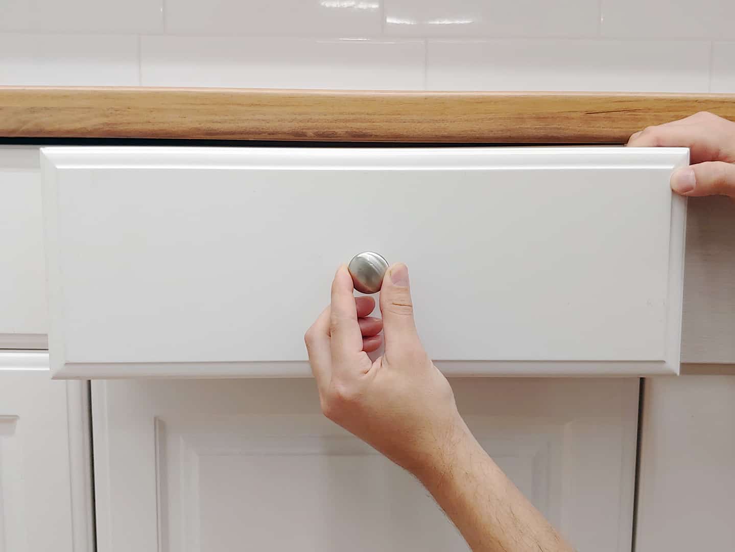 knob installation on cabinet drawer with TP-1934 Cabinet Hardware Jig (step 1)