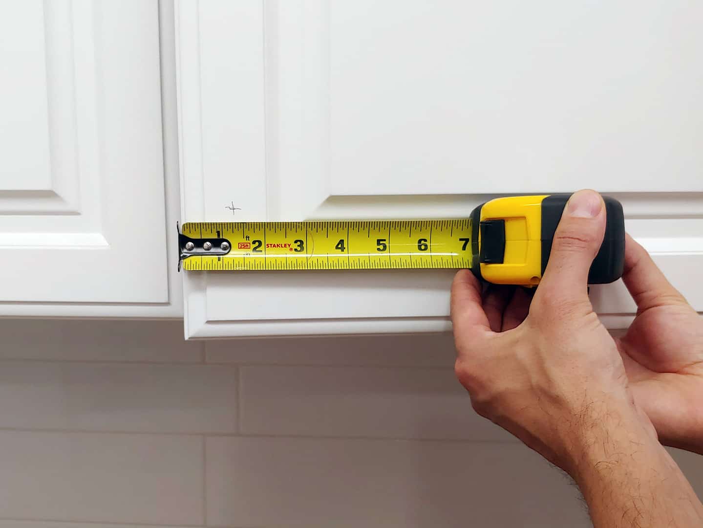 long handle installation on tall cabinet doors with TP-1935 Cabinet Hardware Jig (step 6)